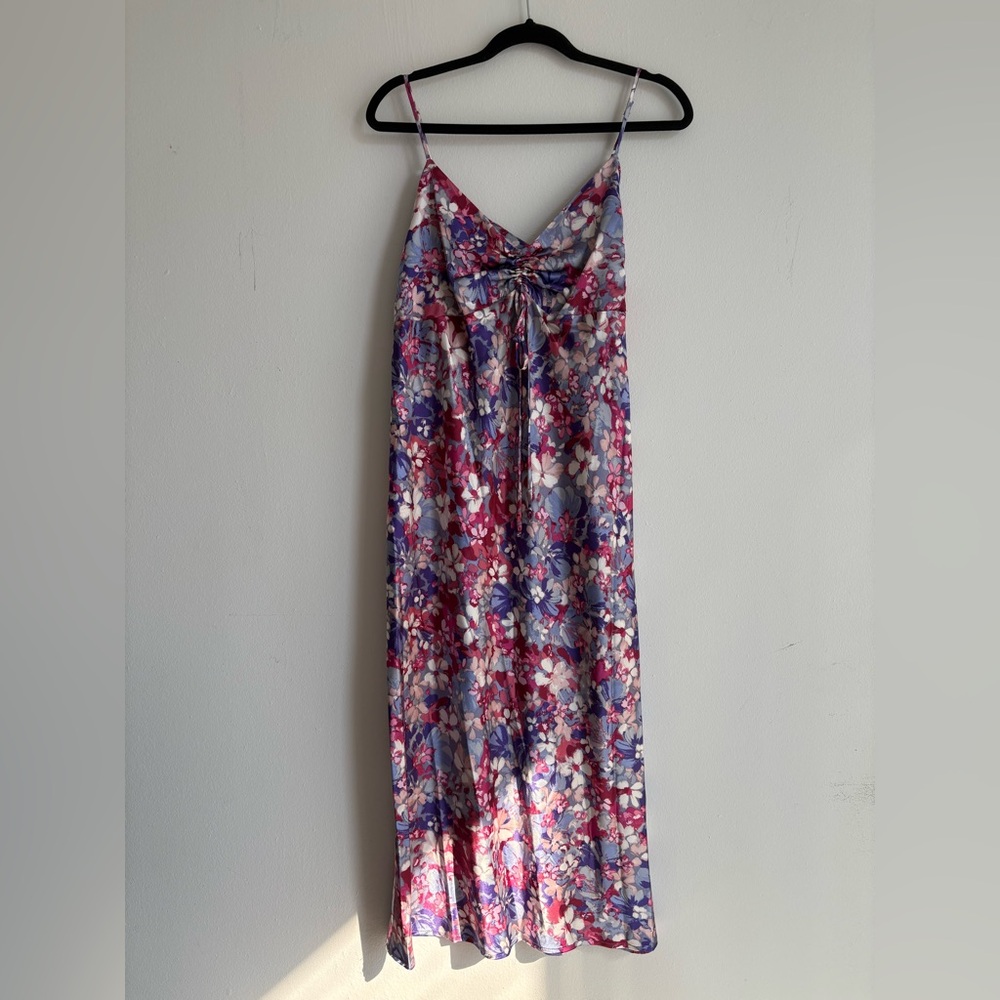 floral midi dress. lightweight satin with a vibrant floral pattern.